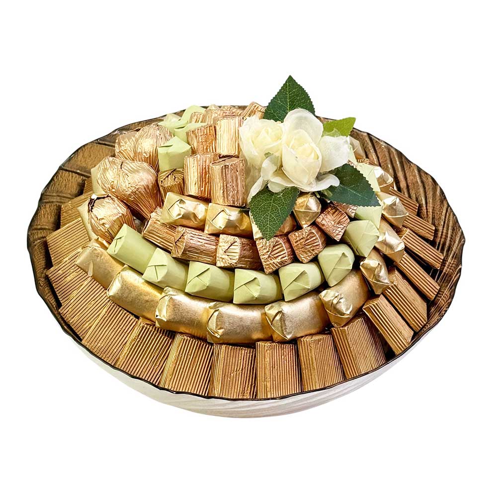 A beautifully arranged platter filled with assorted Milk & Dark chocolate with Gianduja, Praline, Nuts and Feuilletine.